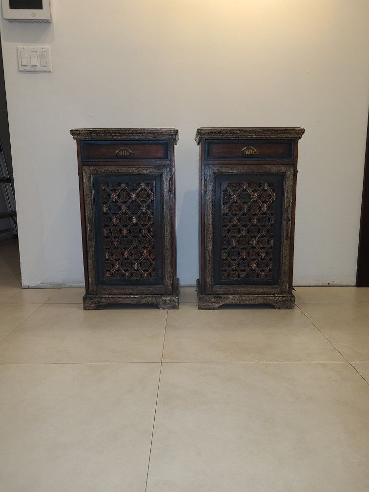 pair of carved wooden end table or night stands
