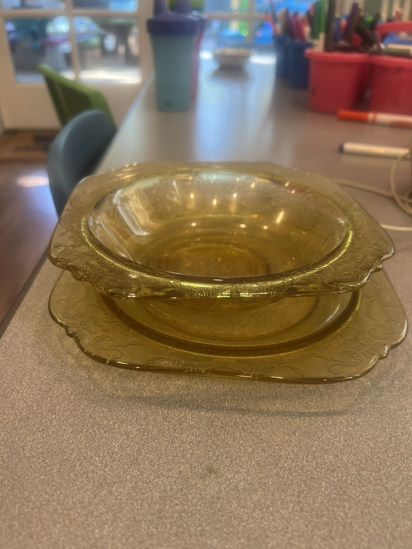 Amber depression, glass bowl, and small plates