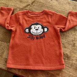 18 mo Cute “Silly Monkey” orange fleece top by Jumping Beans.  Good Condition  Unisex.