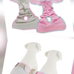 Set of two washable diaper covers in pink and gray. Easy to use and reusable.