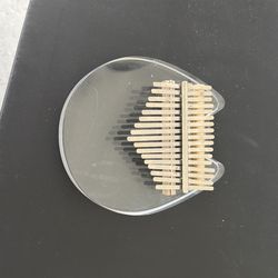 Acrylic thumb piano