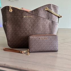 Brand new Michael Kors purse and wallet.