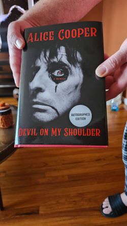 Alice Cooper autographed in person book