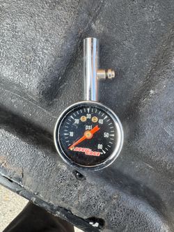 mini dial tire gauge with a range of 0 to 60 PSI