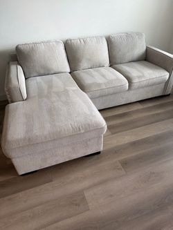 Rooms To Go  sleeper sectional with storage
