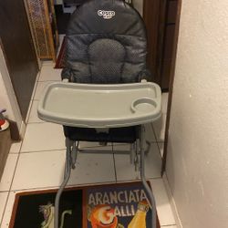 Cosco Hi Chair Easy For Travel Price 20$. Pick Up.  E.  Side.  Tacoma 