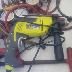 RYOBI CORDED VARIABLE SPEED HAMMER DRILL (NEW)