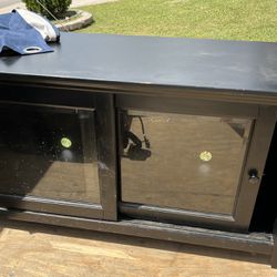 tv stand / entertainment center with glass doors 