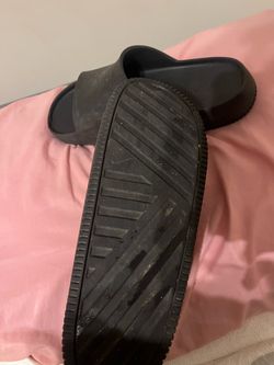 Black Nike slides with diagonal ribbed texture #slides
