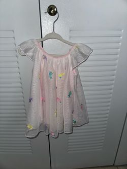 Light pink baby dress with flutter sleeves