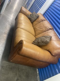 Comfortable Leather Couch ( free delivery)