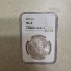 1885 O Morgan Silver Dollar.  Graded 