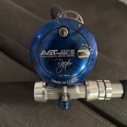 AVET HX5 REEL AND PHENIX ROD