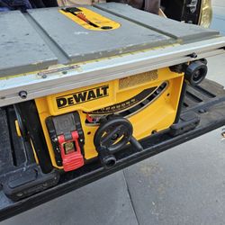 Dewalt 8-1/4in portable table saw, works good, no fence or mitre gauge,  what you see is what you get