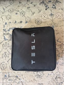 Tesla charging bag and charger