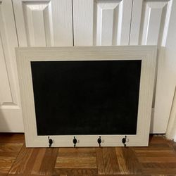 Hanging chalkboard with hooks