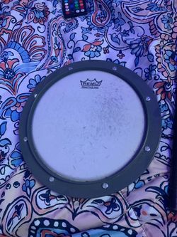 Practice drum pad and 2 sets of drum sticks