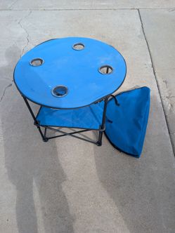 Folding beach table