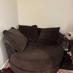 Large Brown Swivel Chair