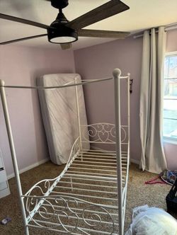 Twin size bed with frame
