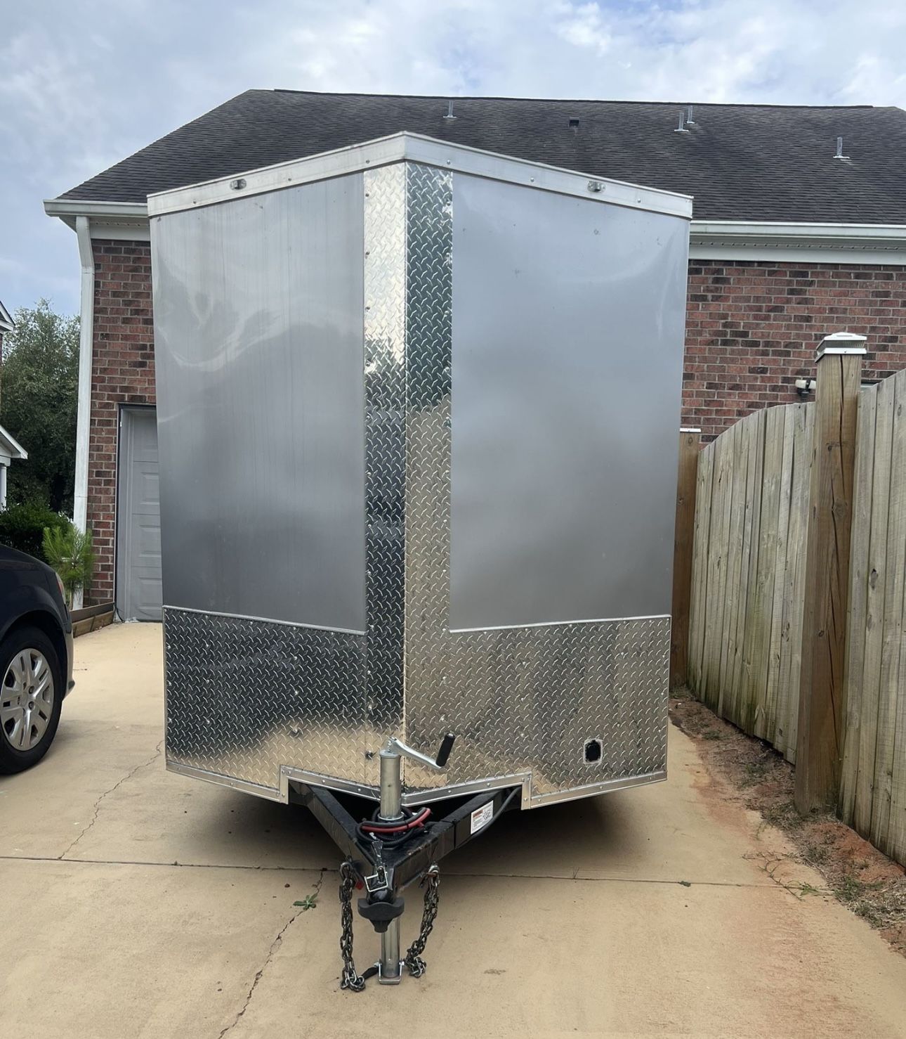 Silver Mist Tandem 6×12 Cargo Trailer A New 6×12 Enclosed Trailer Standard Features Include: 1.) V-Nose Front (Extra Space) With Solid Wall Constructi
