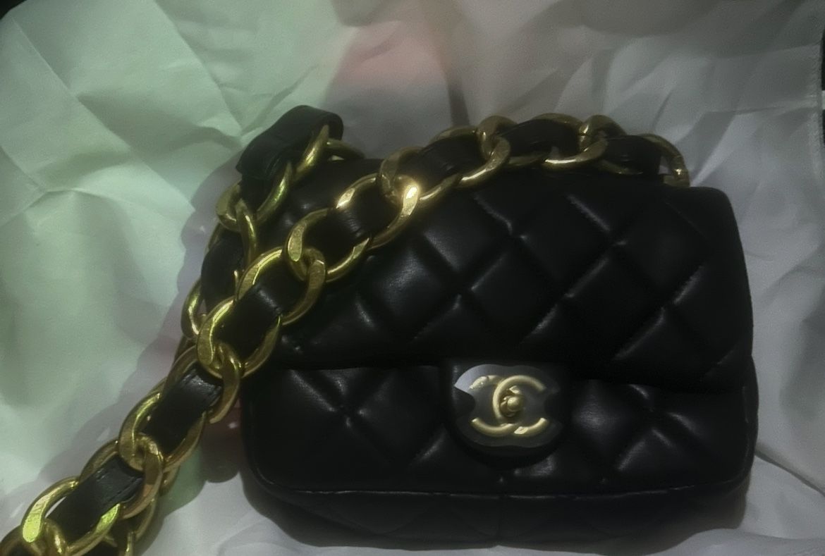 Black And gold Leather Designer bag 