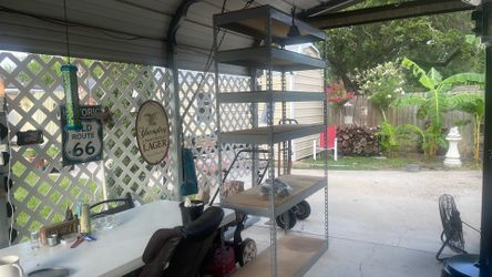 Tall rack with shelves, ideal for work shop