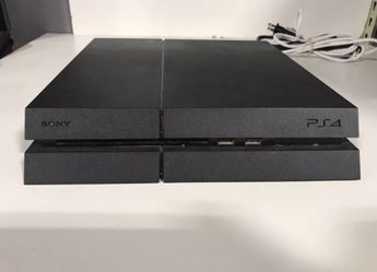 PlayStation 4 (ps4) with controller