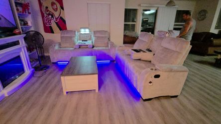 2 Power sofas With L.e.d and Recliners . (Picture is customers)
