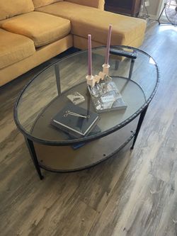 Glass and iron coffee table