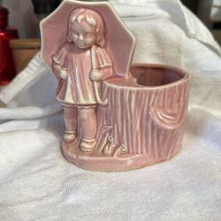 Pink ceramic girl planter 