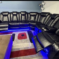 Power electric black leather fully reclining sectional couch