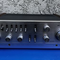 Experience the rich, warm sounds of the Vintage Kenwood KA-8006 Integrated Amplifier. This masterpiece from Japan boasts a powerful output and crystal