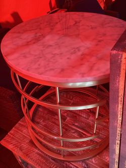 Gold frame with marble like top tables