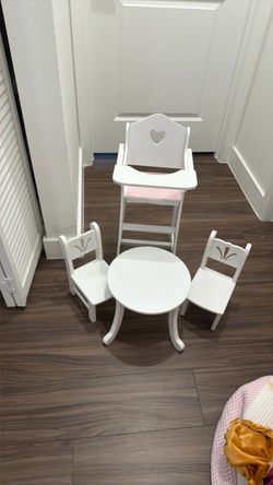 Doll high chair and table and chairs for dolls