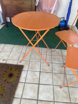 Patio metal table and chairs. 2 sets $45 each.