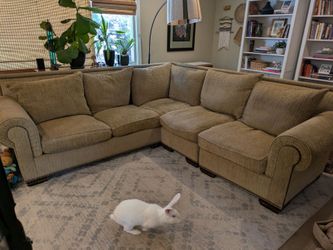 Feather stuffing, nail head, sectional sofa