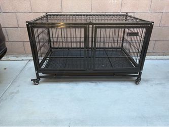 Black dog cage on wheels