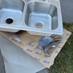 4 hole stainless steel sink  - today 6/14 take for 1/2 price @ $50