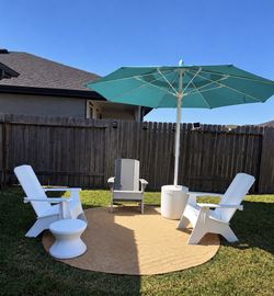 chairs, tables and umbrella