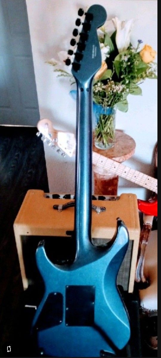 Stagemaster Super Strat Korean made by Fender, 24 Frets H H Set Neck Performing Great Sounds with Factory Floyd Rose; Cool Gun Metal Color. Trade +$