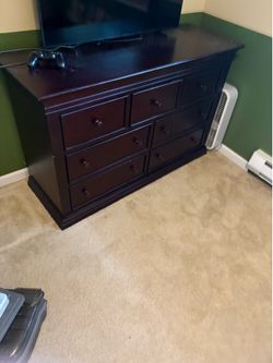 Very high quality heavy duty all wood dresser. Ball bearing drawers. Length 55”x width 19” x height 34”.