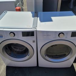 Like New LG Front Load Washer And Stackable Gas Dryer Set 