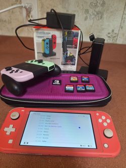 Nintendo Switch Lite Coral Bundle- 2-128GB Cards, Carrying case, Extra Joy-Cons & Dock with 5 games