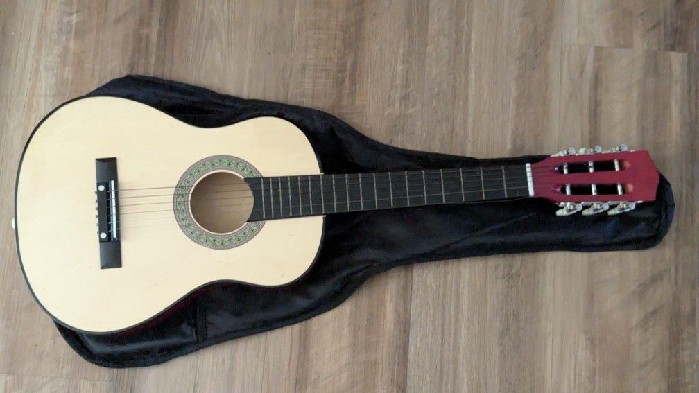 LTD Commodities Small Guitar With Carrying Bag