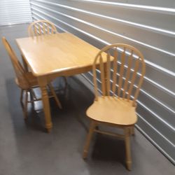 Oak Table And Three Chairs