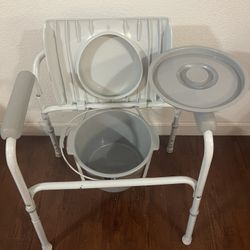 Adjustable Bedside Or Over The Toilet Cammode