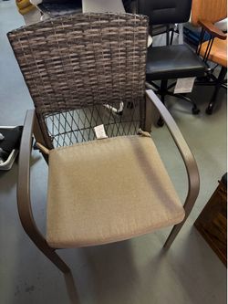 Wicker outdoor dining chair with cushion