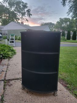 Corner shelving unit