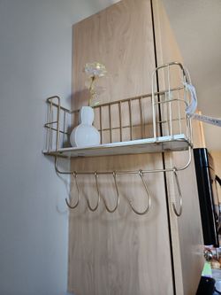 Gold and white shelf